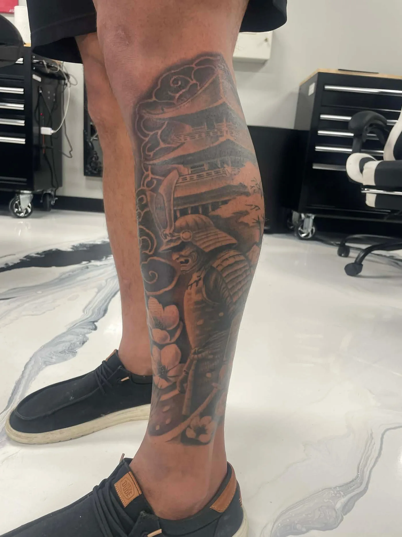 Samurai and Japanese pagoda tattoo on leg